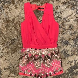 Hot pink and sequined halter romper